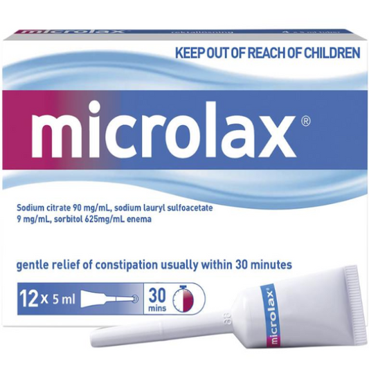 A box containing 12 single-use plastic tubes of Microlax Enema (5ml each) sits on a white background. The box has labeling with the product name, dosage information (12 x 5ml), and directions for use.