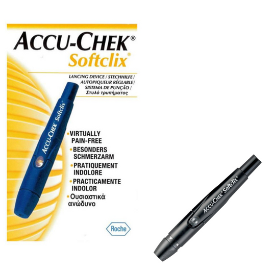 The Accu-Chek Softclix lancing device sits upright on a white background. It has a sleek design with a rotatable cap and a single button for lancet activation. The packaging or a user manual with the Accu-Chek logo may be placed beside the device.
